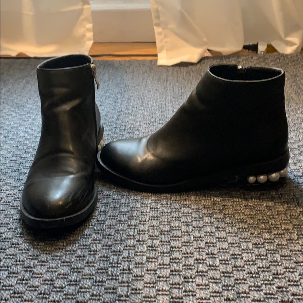 Black booties with pearl heel detail